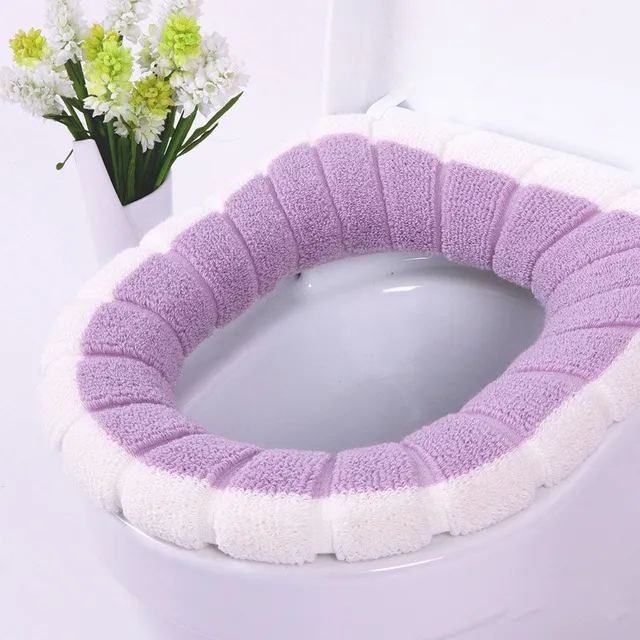 Housse chauffante pour siège de toilette