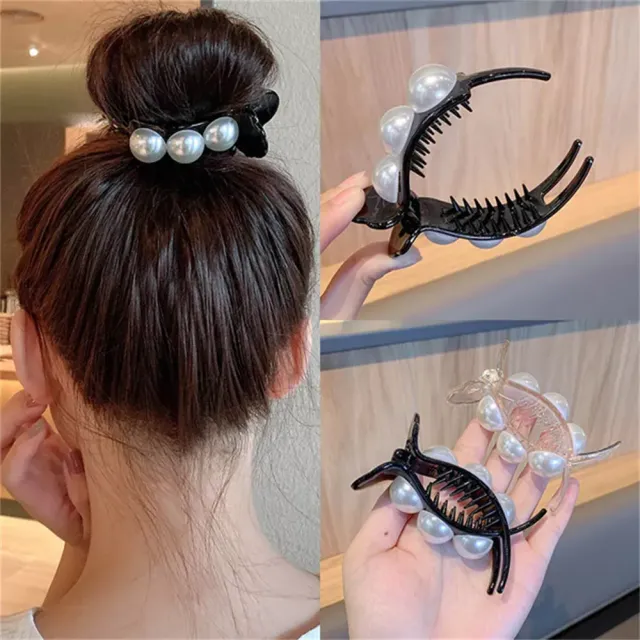 Stylish decoration on the bun in several color variants with decorative pearls