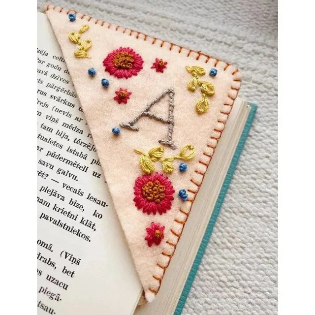 Stylish textile bookmark from decorative filter with design embroidery and initial - more variants