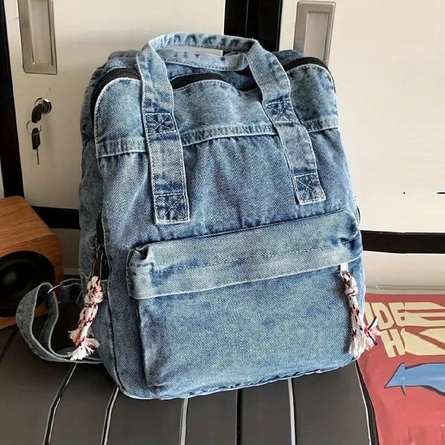 Vintage Denim Backpack - Light travel and school backpack in preppy style on laptop