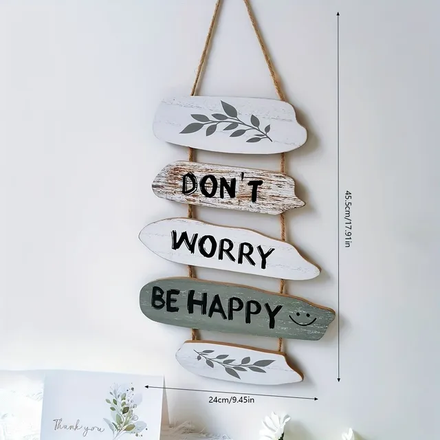 Motivating wooden inscription "Don't worry, be happy"