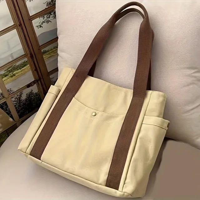 Tote bag with literary motif, more pockets, occasional shoulder cable for school, work and town