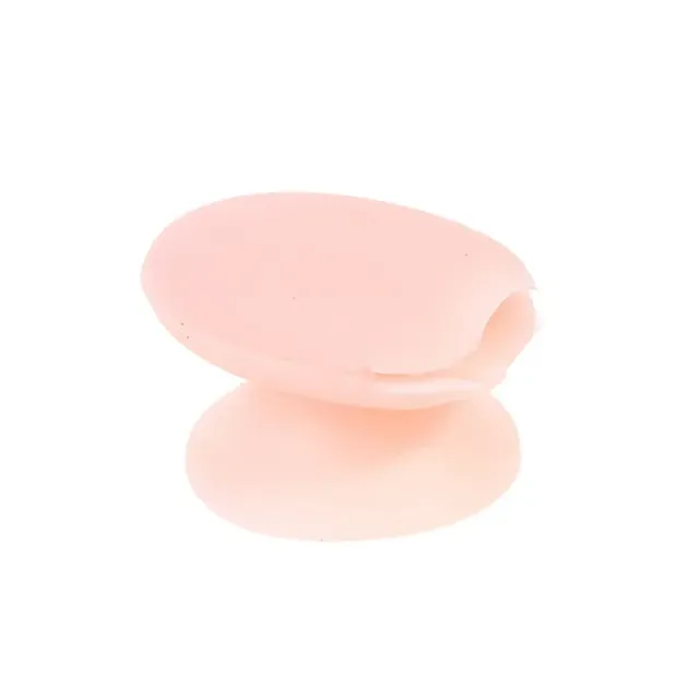 Practical silicone cover with suction cup for lip gloss applicators and eye shadows