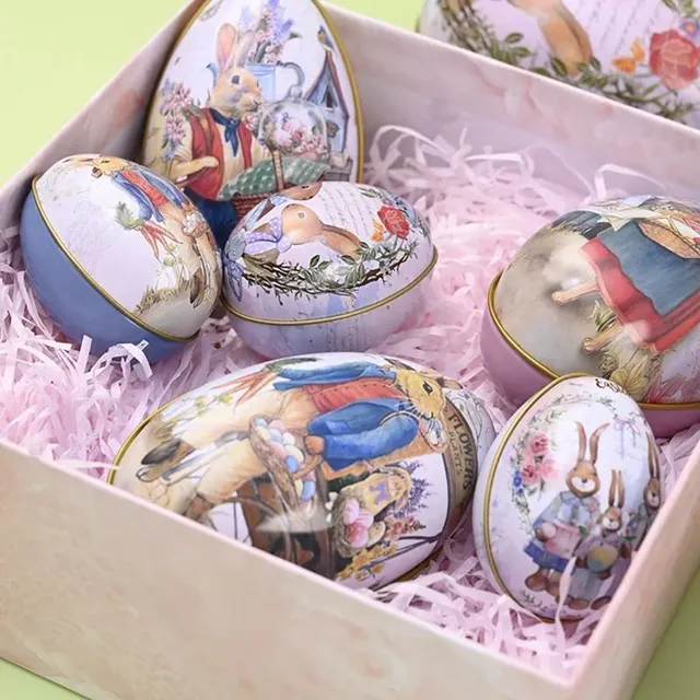 Practical egg-shaped candy tins with Easter motif