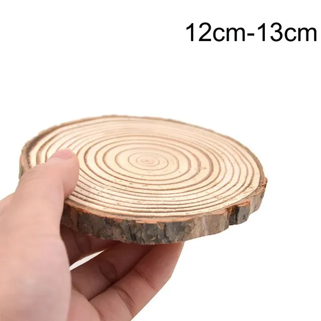 Natural round wooden coaster under a cup for tea, coffee or drinks