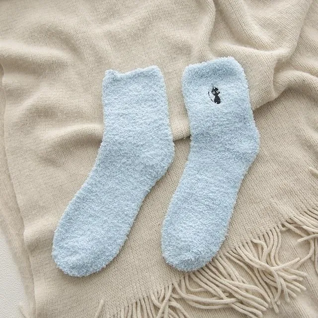 Warm socks in the shape of a paw