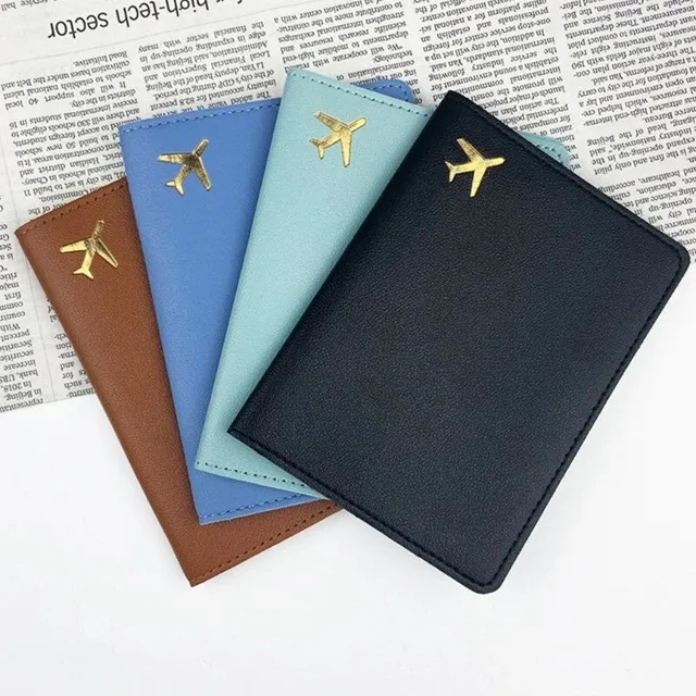 Fashion travel cover for PU leather passport with engraving of aircraft motive - passport protection and credit cards