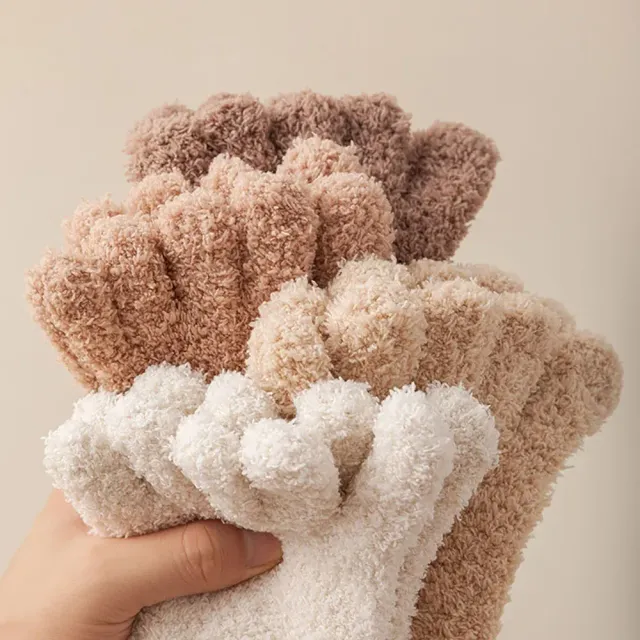 Women's winter socks made of coral fleece with separate fingers at home