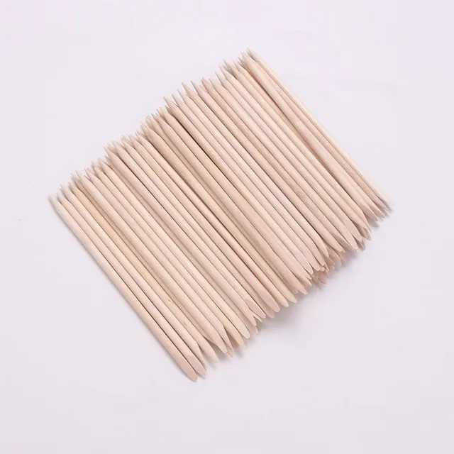 Set of wooden sticks to remove the nail skin