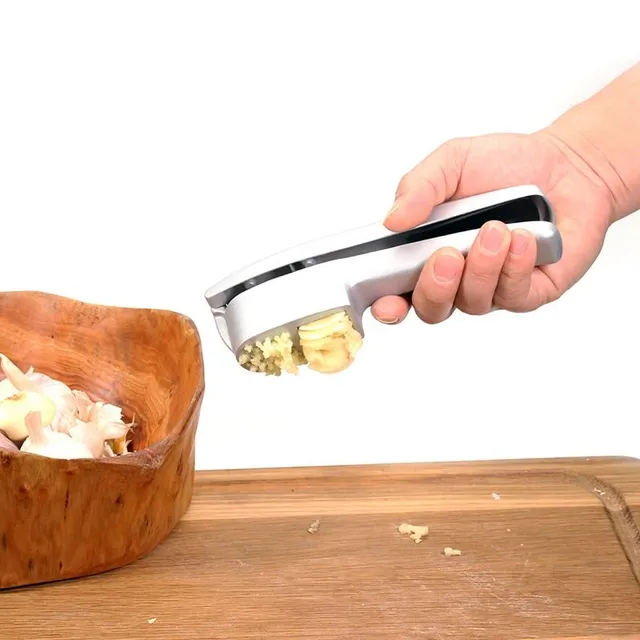 Garlic press and slicer