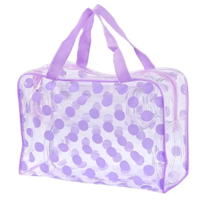 Transparent toiletry bag with polka dot motif for cosmetics and more