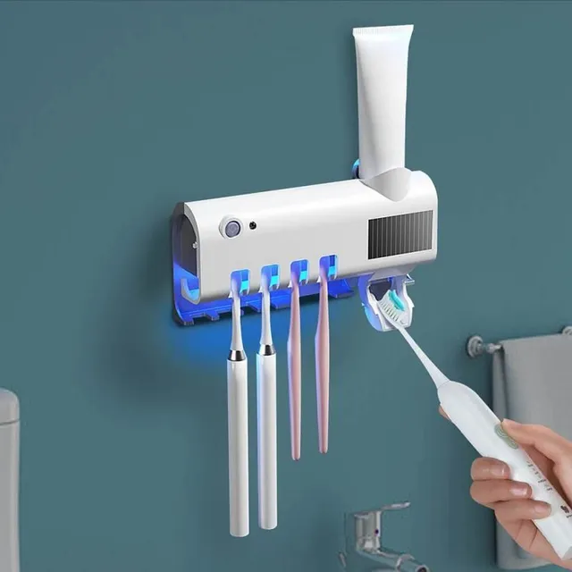 Toothbrush holder with paste dispenser