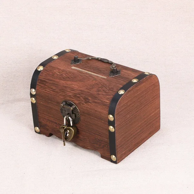 Wooden retro treasure box in the shape of a chest