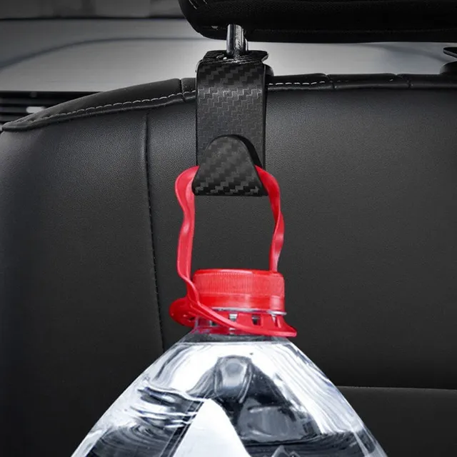 Handy plastic hook for hanging on the headrest of front seats for Wade bags and backpacks