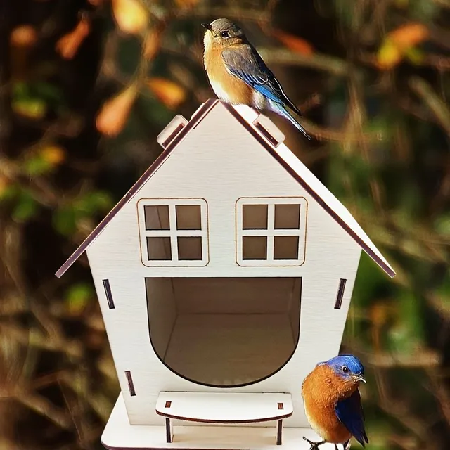 Bird feeder made of wood with a bed and a tray, suitable for outdoor garden