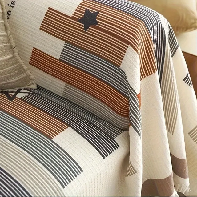 Sofa cover with waffle pattern and fringes of cotton mixture