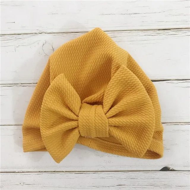 Children's hat with bow zluta