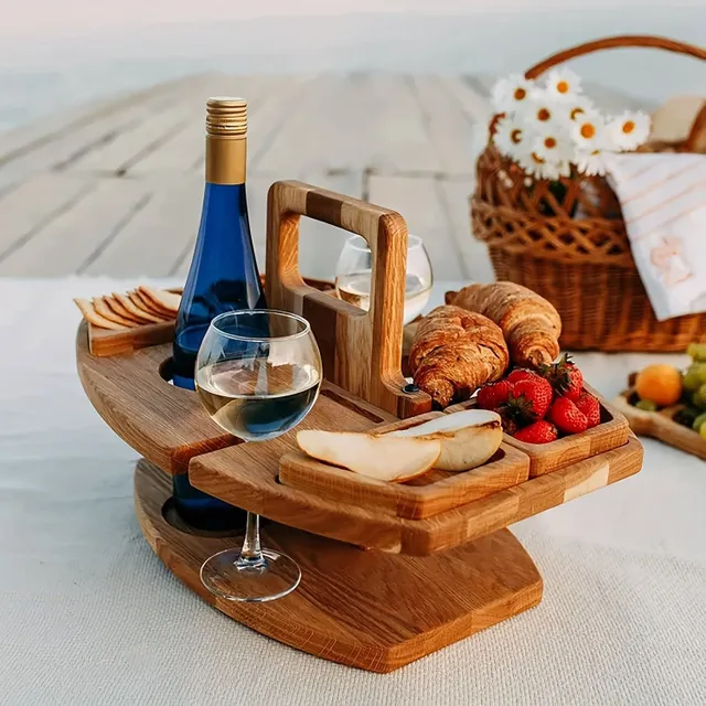 Folding picnic table with wine holders and wooden snack tray