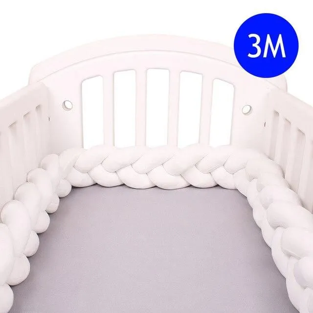 Crib mattress cover in the shape of a braid