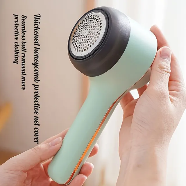 Charging hair remover from USB substances: Portable machine for domestic removal of lumps, hair from sweaters and clothing with fibres