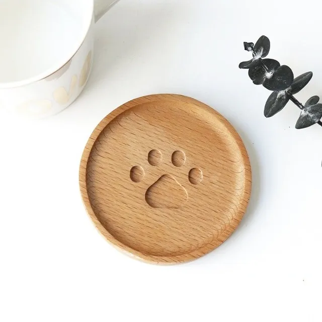 Wooden coaster with paw