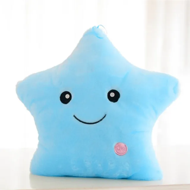 Beautiful plush glowing cushion in the shape of a star