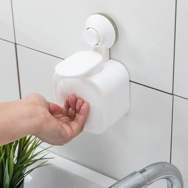 Bathroom soap dispenser with suction cup