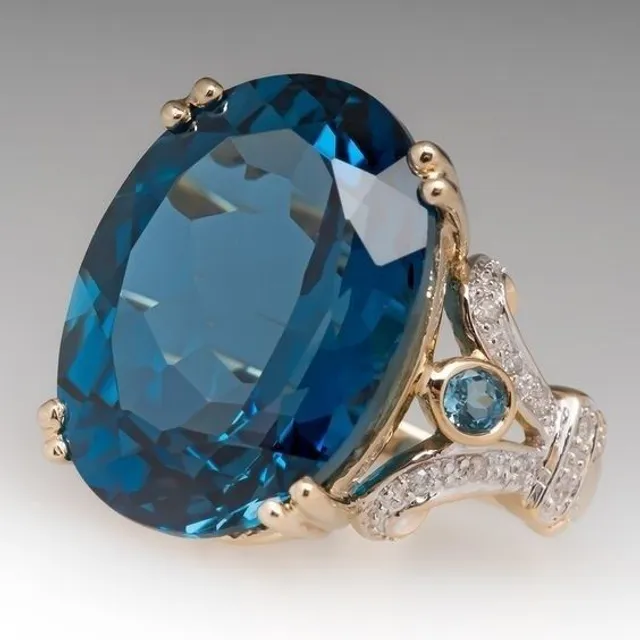 Extravagant luxury chunky ladies ring with large blue cubic zirconia Ryan