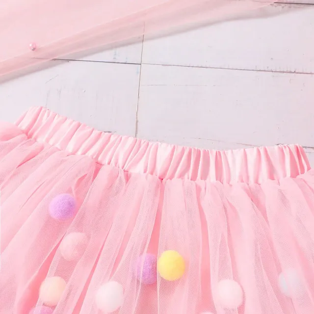 Girl's tutu skirt in tulle with colourful plush balls