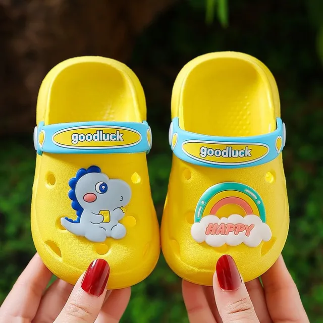 Children's perforated foam slippers with cute accessory