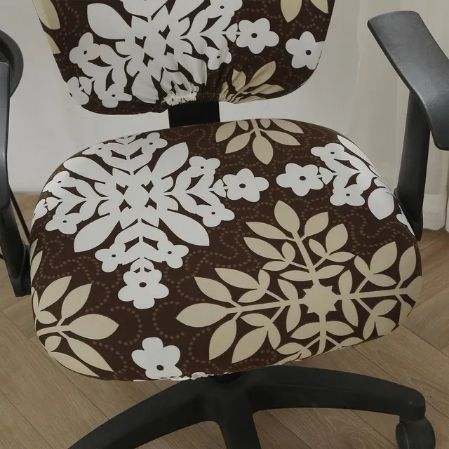 Decorated covers on the chair to Joi's computer