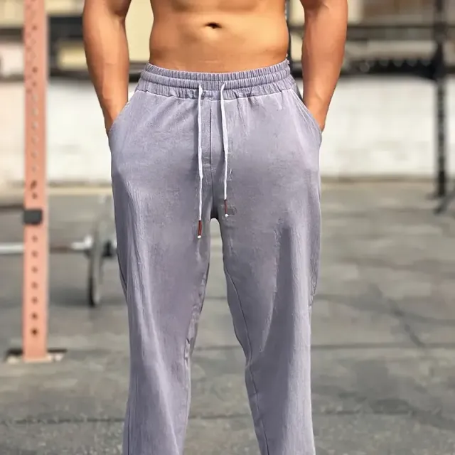 Comfortable men's sweatpants made of cotton, free cut, suitable for outdoor activities