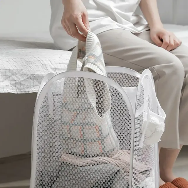 Folding netted laundry basket