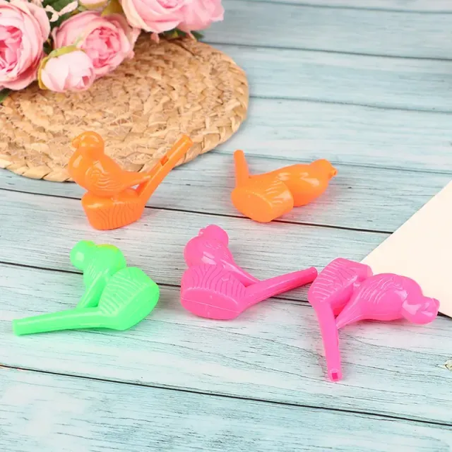 Set of color whistles in the shape of birds - mix of random colors