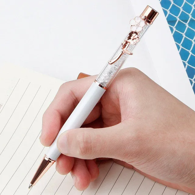 Designer office pen with luxurious flower-shaped decoration and glitters