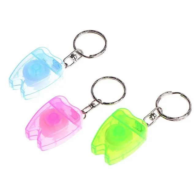 Practical keyring in the shape of a tooth with dental floss - several colour variants Jalil