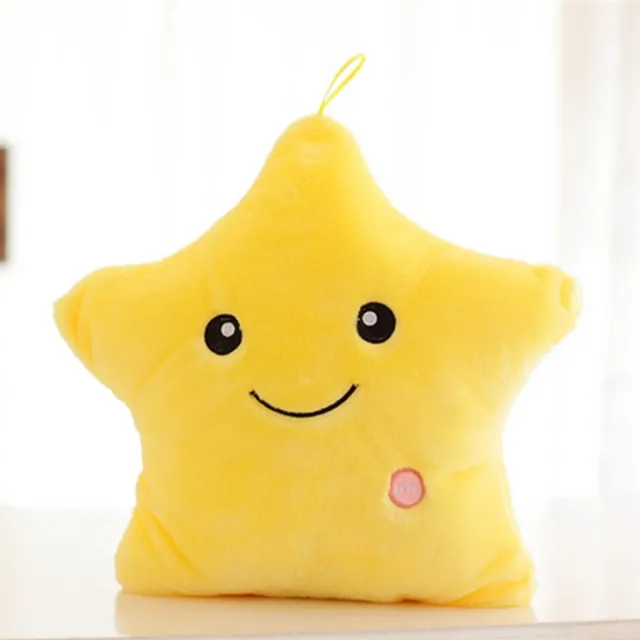 Beautiful plush glowing cushion in the shape of a star