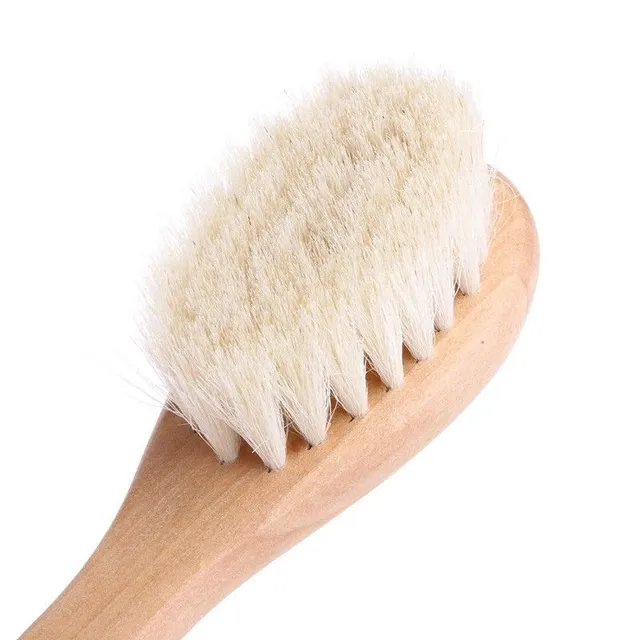 Brosse pour les premiers cheveux de bébé