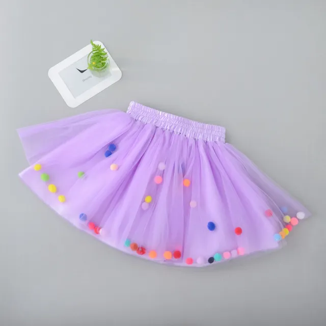 Girl's tutu skirt in tulle with colourful plush balls