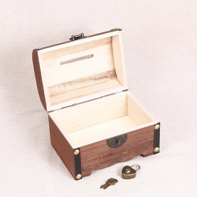 Wooden retro treasure box in the shape of a chest