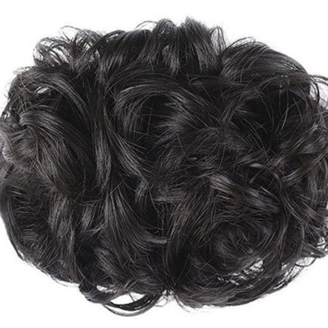 Curly hairpiece on the rack