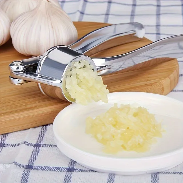 Stainless steel garlic and ginger press - practical kitchen helper for crushing and cutting