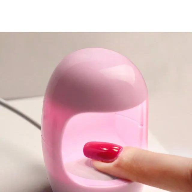 Mini UV/LED gel nail lamp with quick curing for home manicure