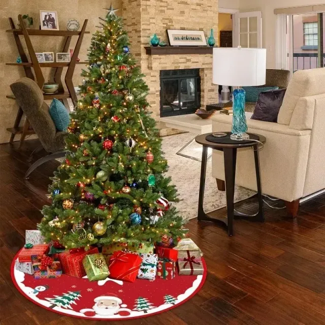 Practical fabric rug under the Christmas tree with a snowman, reindeer or Santa Claus motif