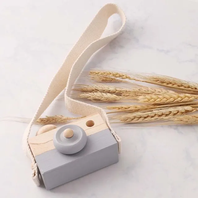 Wooden camera with strap