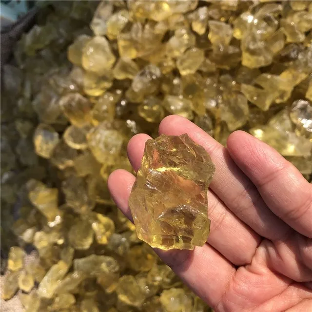 Natural raw topaz crystal in yellowish colour with healing effects Gregory