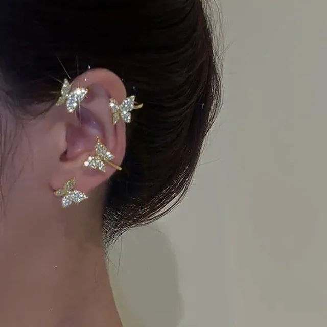 Fake earrings over the whole ear - glittering butterflies