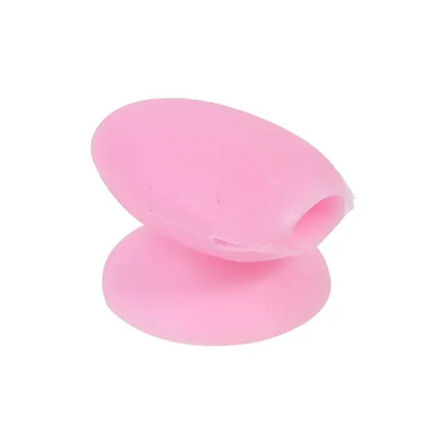 Practical silicone cover with suction cup for lip gloss applicators and eye shadows