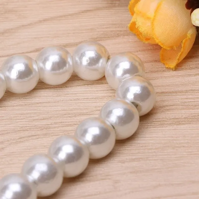 Decorative hanger with pearls