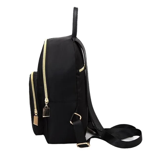 Women's backpack with gold zipper
